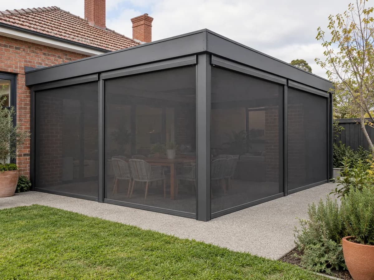 Four black zip screens fully lowered to enclose an L-shaped alfresco
